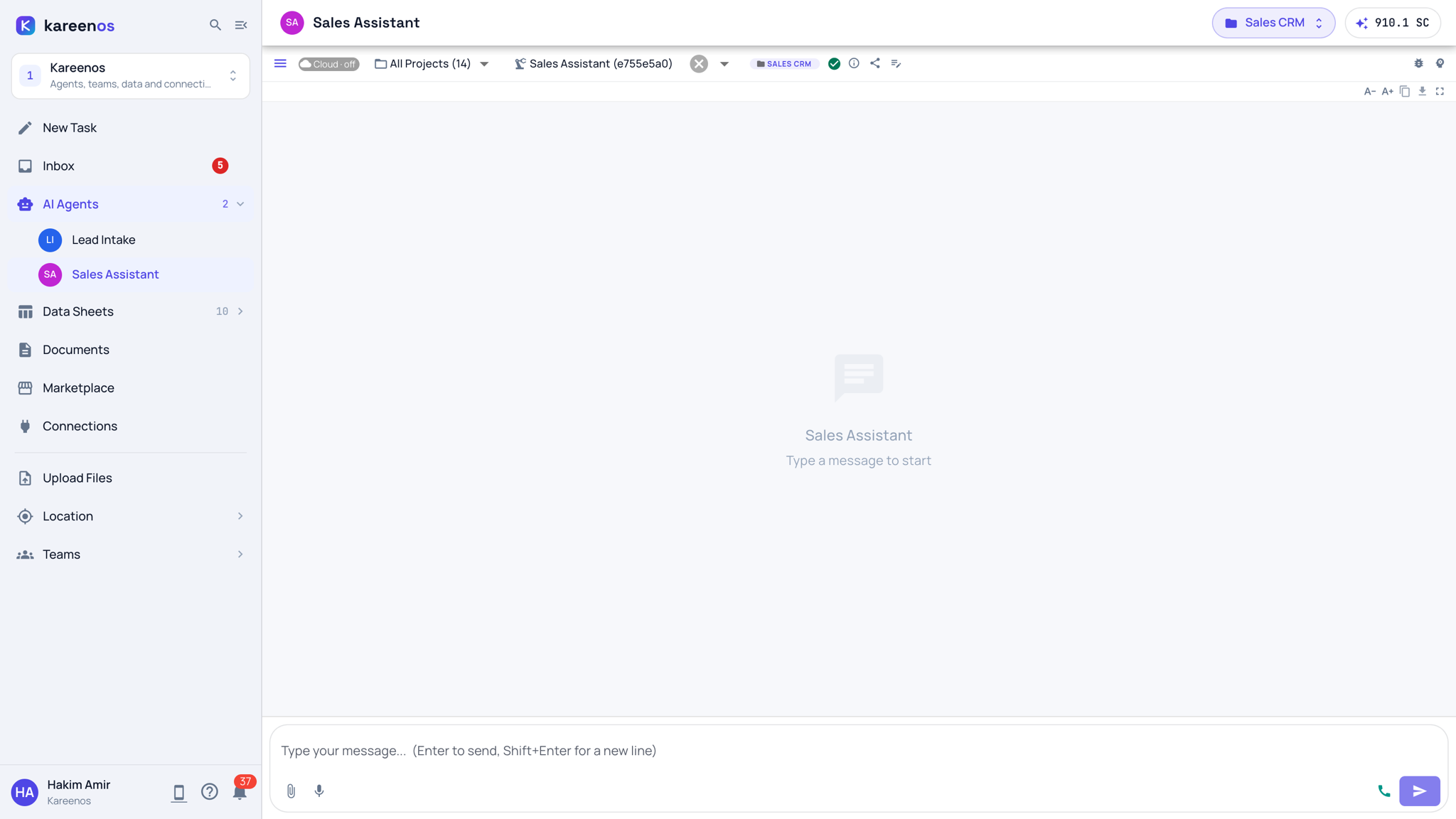 An agent's chat page: AI Agents open in the sidebar with Lead Intake and Sales Assistant, the Sales Assistant named in the top bar, the agent bar with the project and agent pickers, and the message box with attach, microphone and call buttons